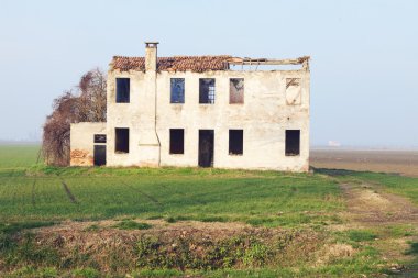 Abandoned farmhouse in the countryside, delta del po, italy clipart