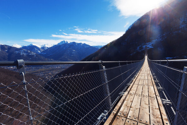Mountain landscape with suspension bridge
