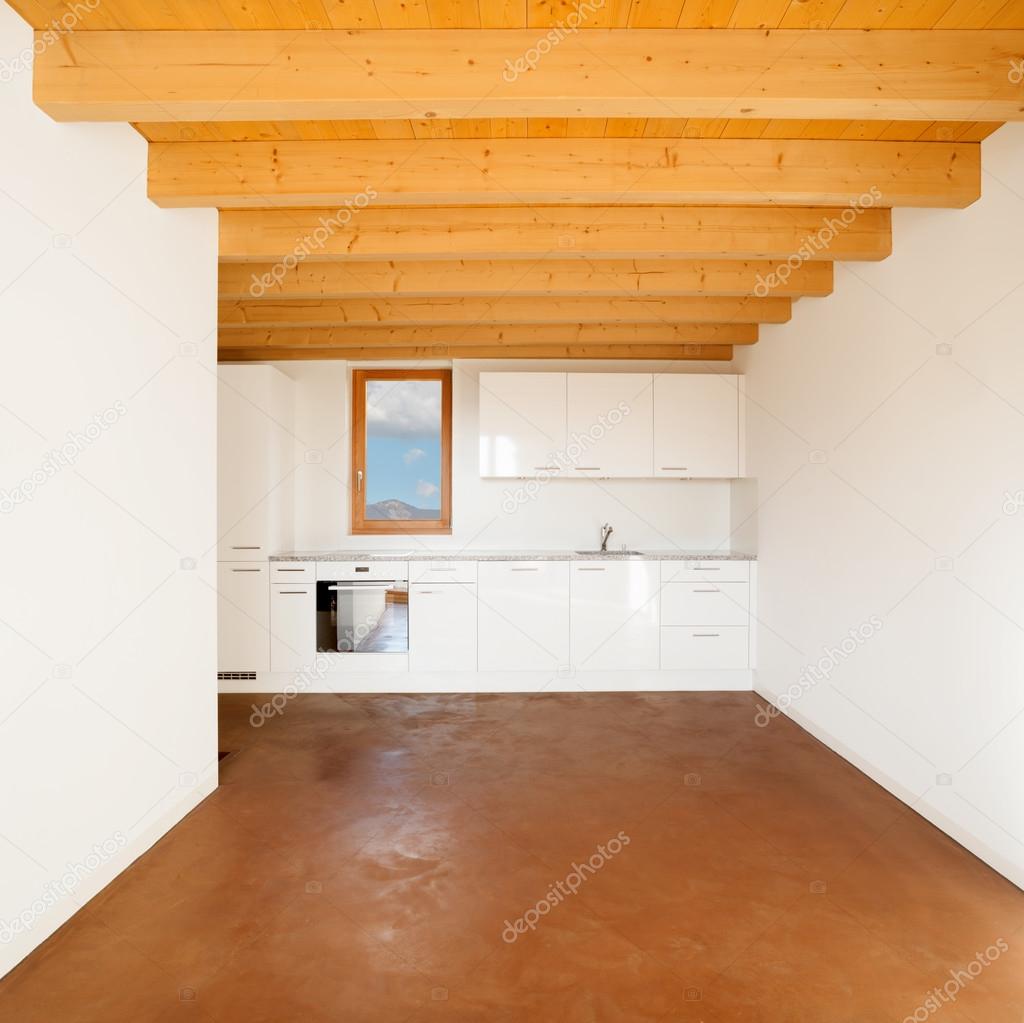 Apartment on different floors with laminate floor and wooden cei