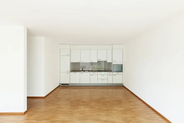 Sala de estar vazia com cozinha — Fotografia de Stock