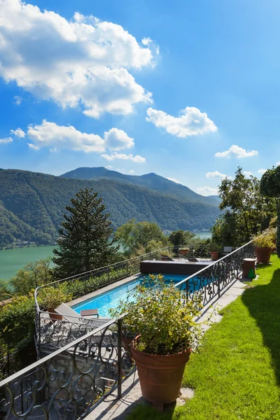Beautiful terrace with swimming pool — Stock Photo, Image