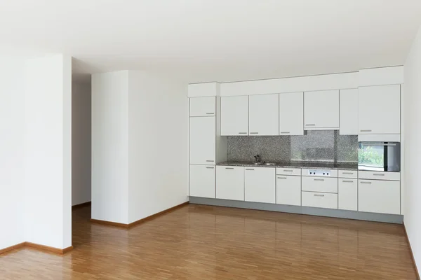 Lege woonkamer met keuken — Stockfoto