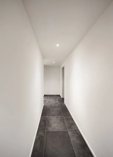 Interior, corridor with tiled floor black — Stock Photo, Image