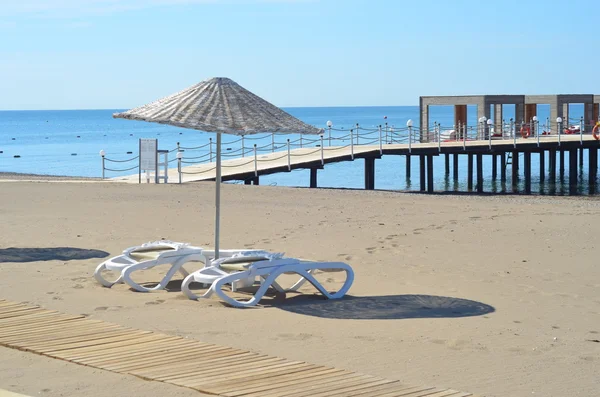 Beach chairs on sand beach with  blue sky — Stock Photo, Image