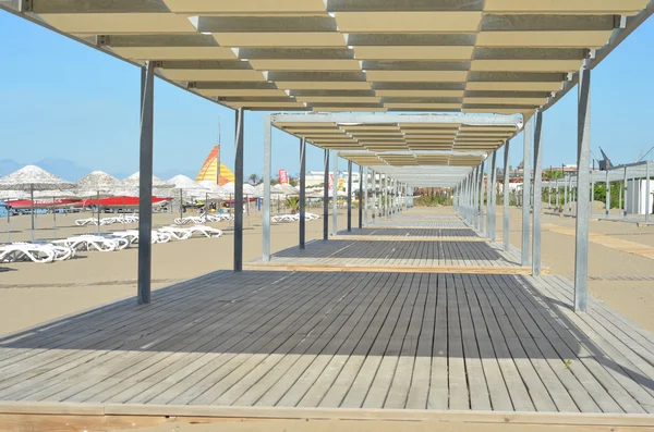 Trä plankor och strand bakgrund med kopierings utrymme Stockbild