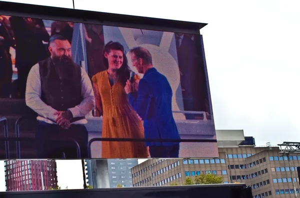 Opening ceremony of the new Markthal on 01 October 2014 in Rotterdam, Netherlands. on big street tv screen — Stock Photo, Image