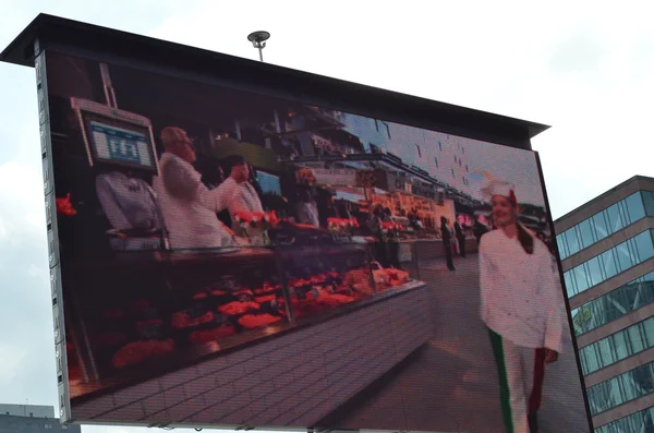 Opening ceremony of the new Markthal on 01 October 2014 in Rotterdam, Netherlands. on big street tv screen — Stock Photo, Image