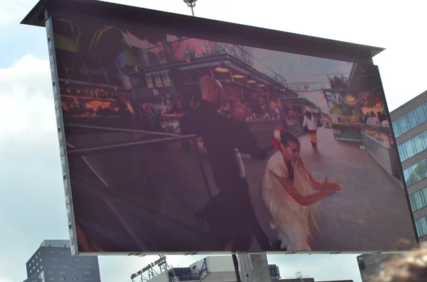 Opening ceremony of the new Markthal on 01 October 2014 in Rotterdam, Netherlands. on big street tv screen — Stock Photo, Image