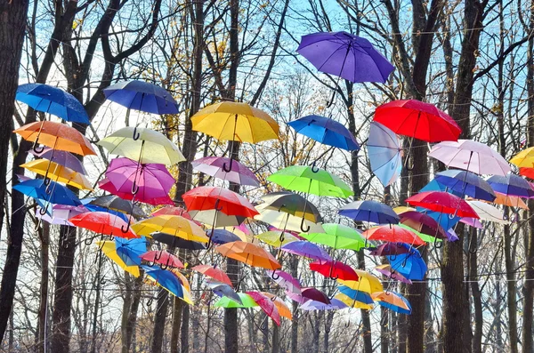 Сolorful umbrellas hanging in the air — Stock Photo, Image