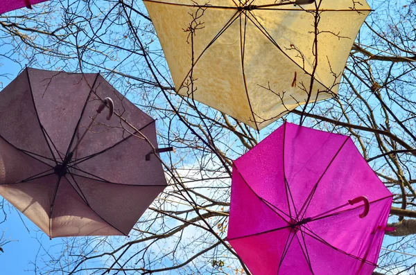 Сolorful umbrellas hanging in the air — Stock Photo, Image