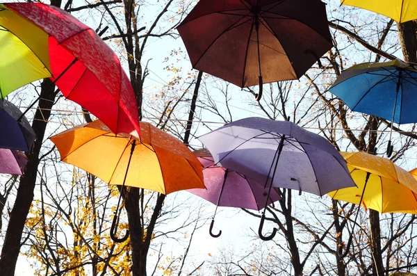 Сolorful umbrellas hanging in the air — Stock Photo, Image