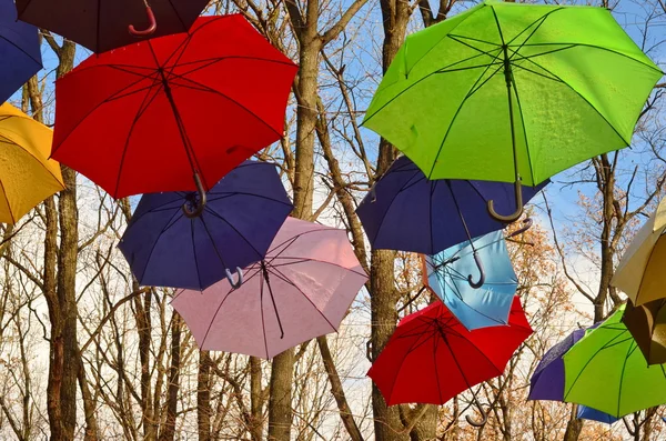 Сolorful umbrellas hanging in the air — Stock Photo, Image