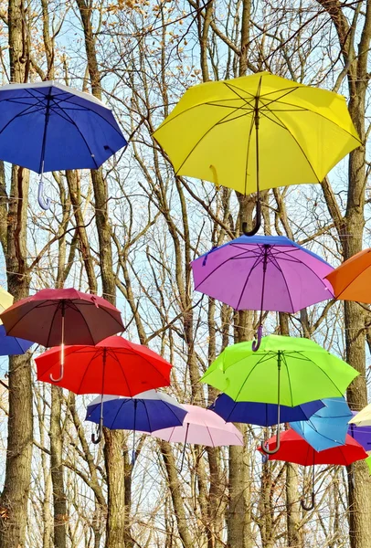 Multicolored umbrellas up in the sky. Rainbow Colors. — Stock Photo, Image