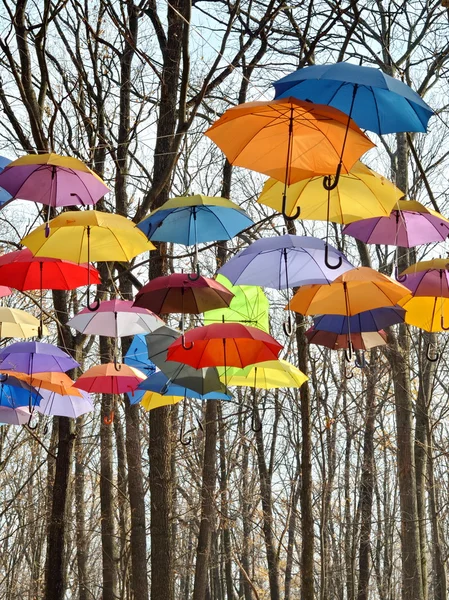 Multicolored umbrellas up in the sky. Rainbow Colors. — Stock Photo, Image