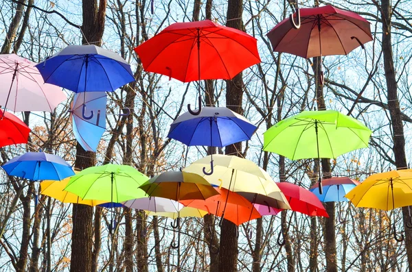 Multicolored umbrellas up in the sky. Rainbow Colors. — Stock Photo, Image