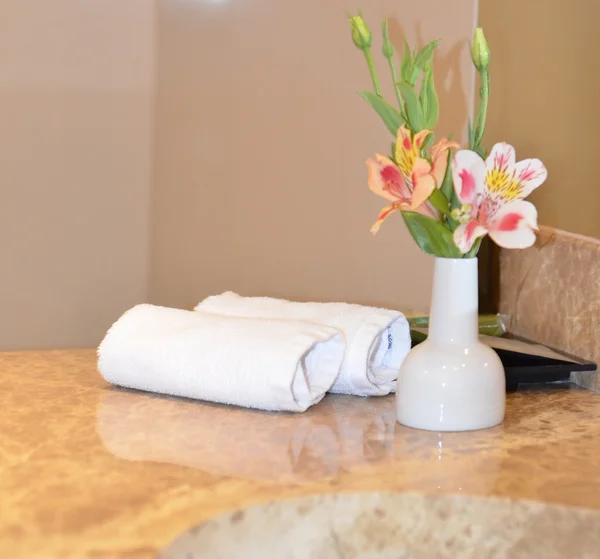 Bathroom interior rolled up towels — Stock Photo, Image