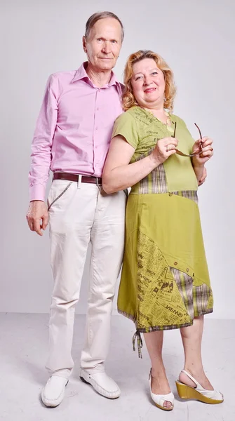 Elderly happy couple standing in full length — Stock Photo, Image