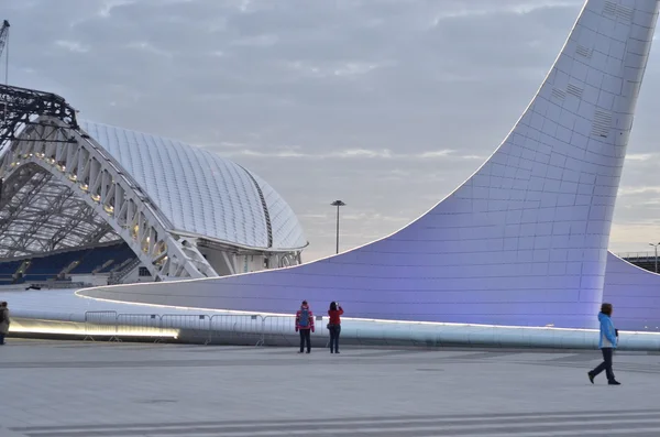 Olympic Torch in Olympic park and Olympic stadium Fisht in Sochi, Russia — Stock Photo, Image