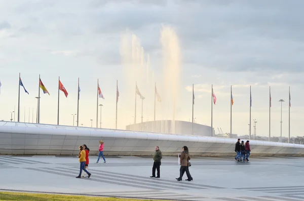 People walking in Olympic park in Sochi, Russia.