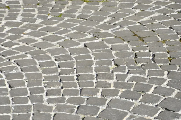 Graue Pflastersteine des Roten Platzes in Moskau im Winter als