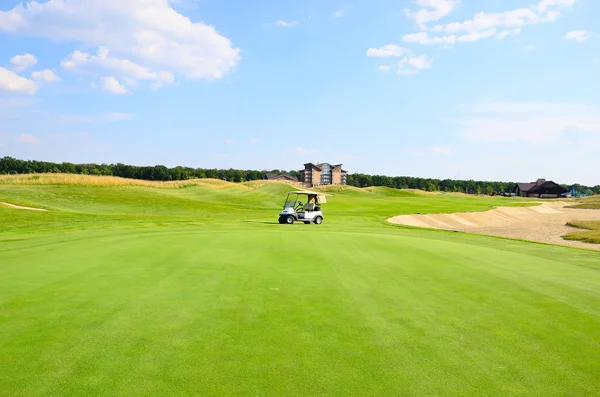 Golf course. Golf car — Stok fotoğraf