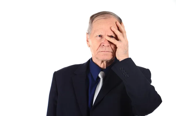 Stressfull uomo in piedi contro sfondo bianco — Foto Stock