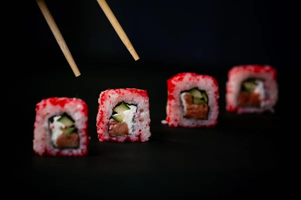 Chopsticks Take California Sushi Rolls Chinese Chopsticks Selective Focus Black — Fotografia de Stock