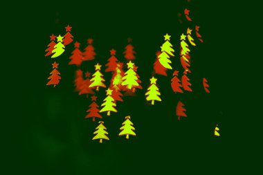 Bokeh noel ağacı şeklinde. Yeni yıl geçmişi. Seçici odak.