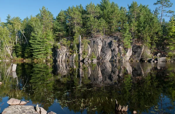 Rock Face Reflection Stock Picture