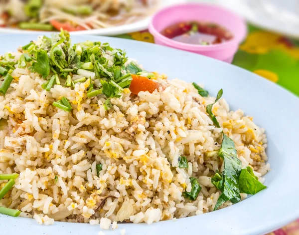 Mixed cooked rice with fried crab , sauce and vegetable on dish — Stock Photo, Image