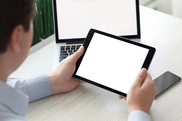 Homem segurando tablet computador com tela isolada notebook telefone — Fotografia de Stock