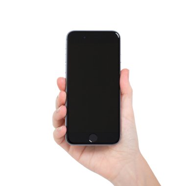 Alushta - 13 Kasım 2014: yeni telefon iPhone 6 Space Gray 'i elinde tutan kadın. iPhone 6 Apple Inc. tarafından oluşturuldu ve geliştirildi.