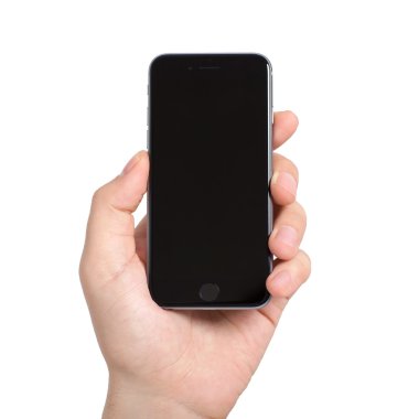 Alushta - 13 Kasım 2014: Elinde tutan adam yeni telefon iPhone 6 Space Gray 'i izole etti. iPhone 6 Apple Inc. tarafından oluşturuldu ve geliştirildi.