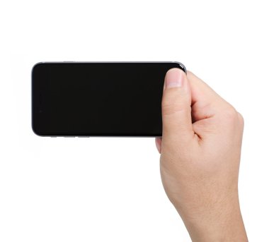 Alushta - 13 Kasım 2014: Elinde tutan adam yeni telefon iPhone 6 Space Gray 'i izole etti. iPhone 6 Apple Inc. tarafından oluşturuldu ve geliştirildi.