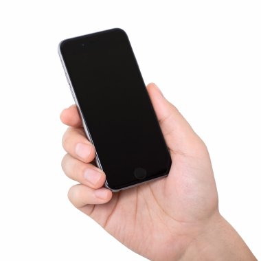 Alushta - 13 Kasım 2014: Elinde tutan adam yeni telefon iPhone 6 Space Gray 'i izole etti. iPhone 6 Apple Inc. tarafından oluşturuldu ve geliştirildi