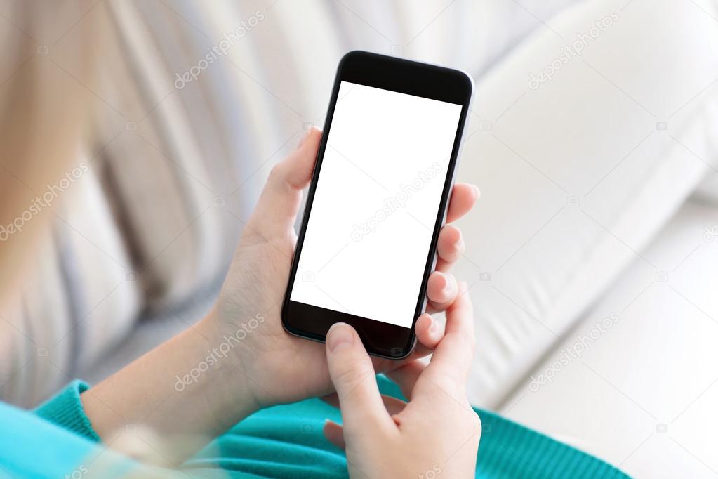 girl sitting and holding a phone with isolated screen