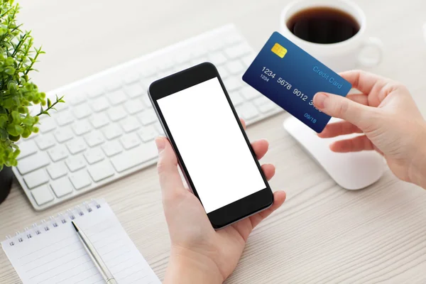 Female hands holding phone with isolated screen and credit card — Stock Photo, Image