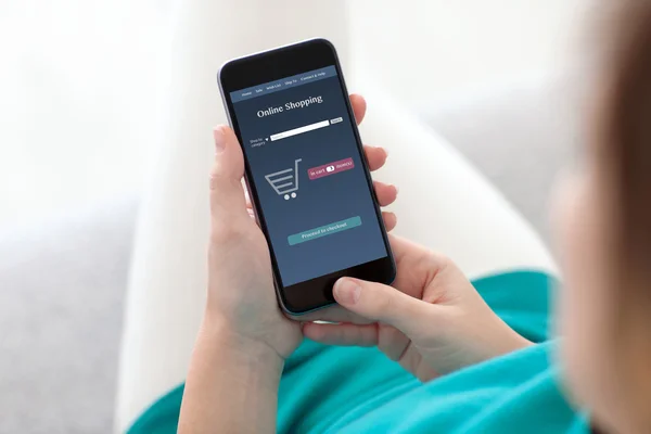 Woman makes online shopping on a tablet — Stock Photo, Image