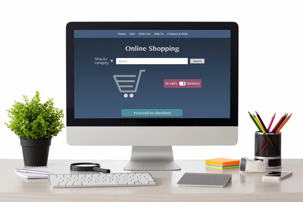 Computer mit Onlain-Shopping-Site mit Telefon und Uhr — Stockfoto