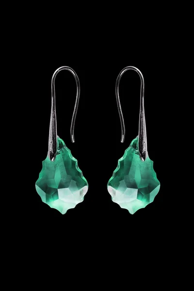 Earrings on black — Stock Photo, Image