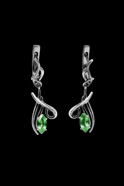 Earrings on black — Stock Photo, Image