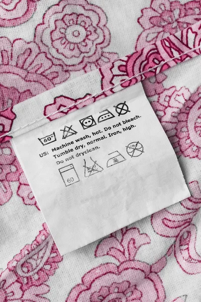 Washing instructions label — Stock Photo, Image