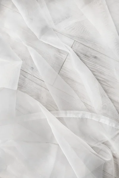 Białego tiulu na podłodze — Zdjęcie stockowe