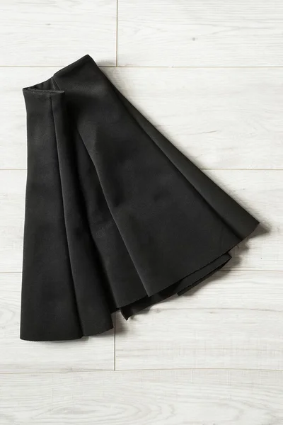 Skirt on wooden background — Stock Photo, Image