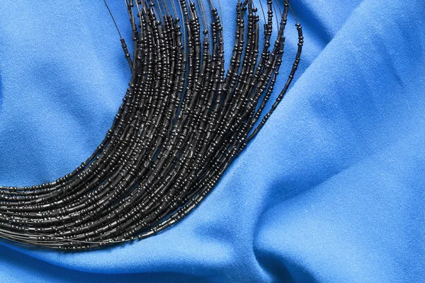 Beads on cloth — Stock Photo, Image