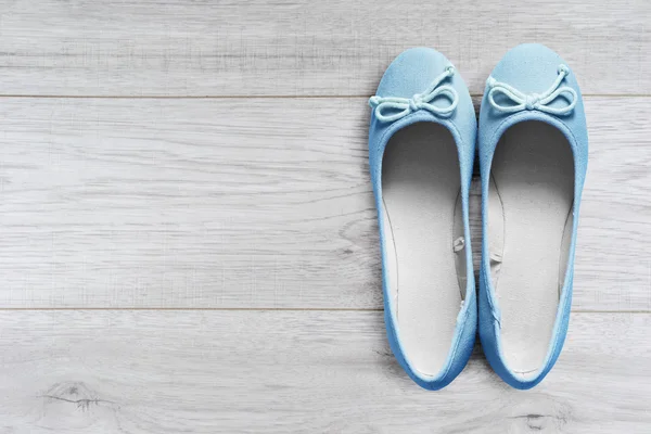 Shoes on wooden floor — Stock Photo, Image