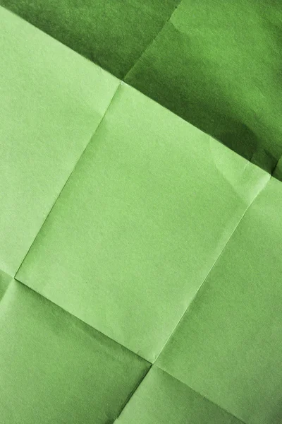 Papel verde plegado —  Fotos de Stock