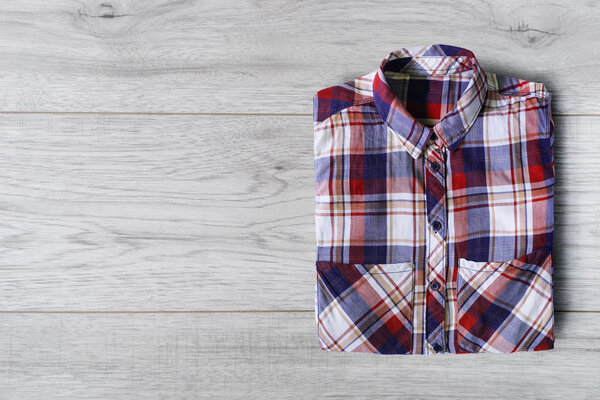 Shirt on wooden background