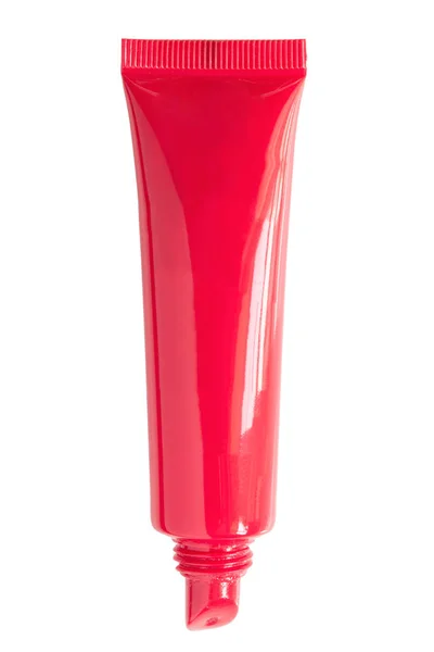 Boş Kırmızı Plastik Beyaz Üzerine Izole Edilmiş Bir Tüp — Stok fotoğraf