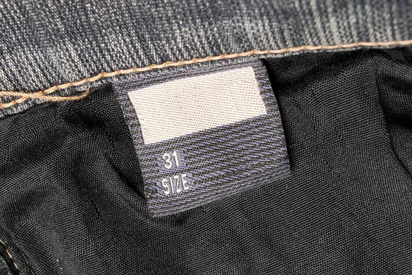 Tamaño Etiqueta Ropa Sobre Fondo Textil Primer Plano — Foto de Stock